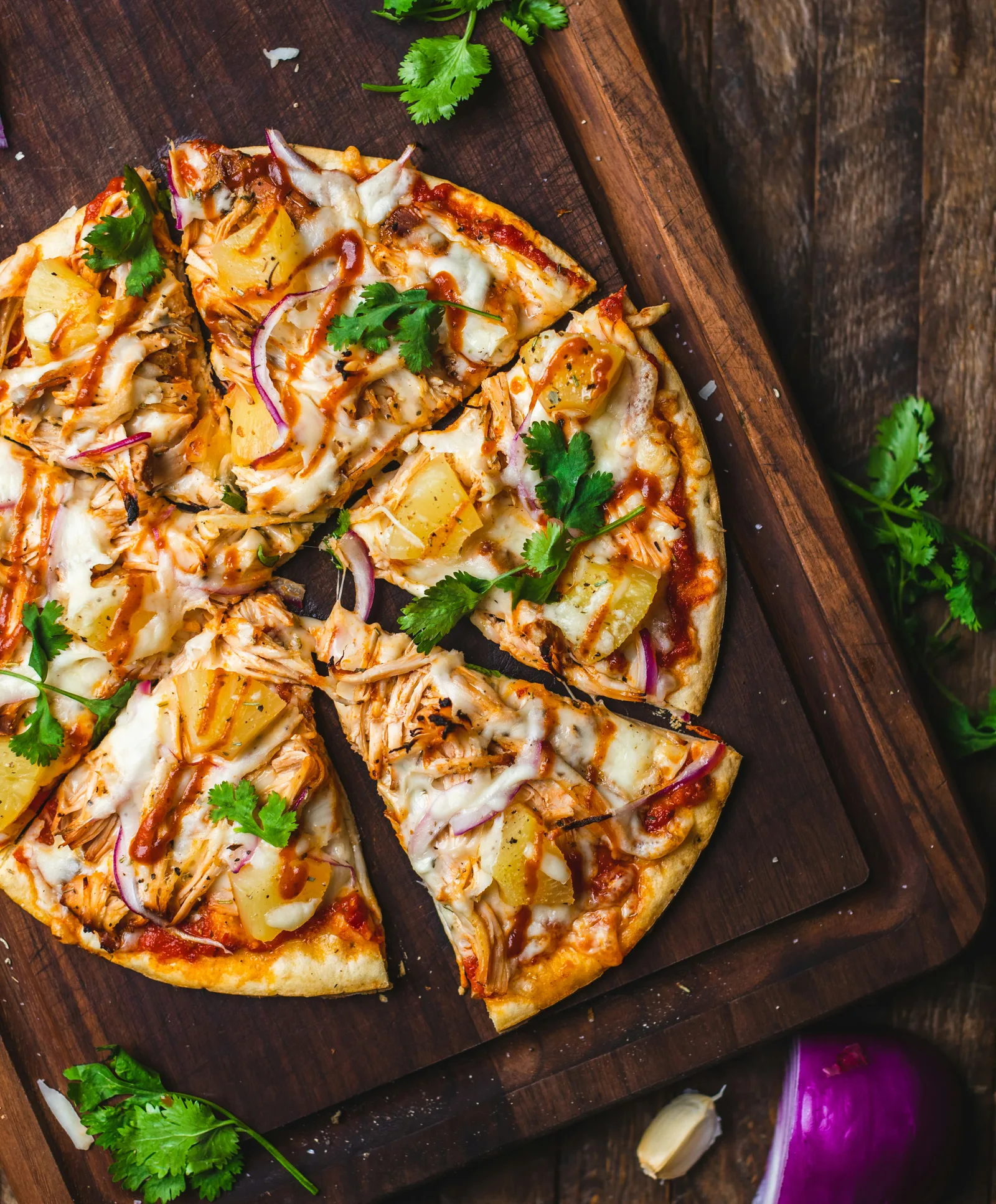Freshly baked Masala Margherita pizza at Spice Garden with vibrant South Indian spice toppings